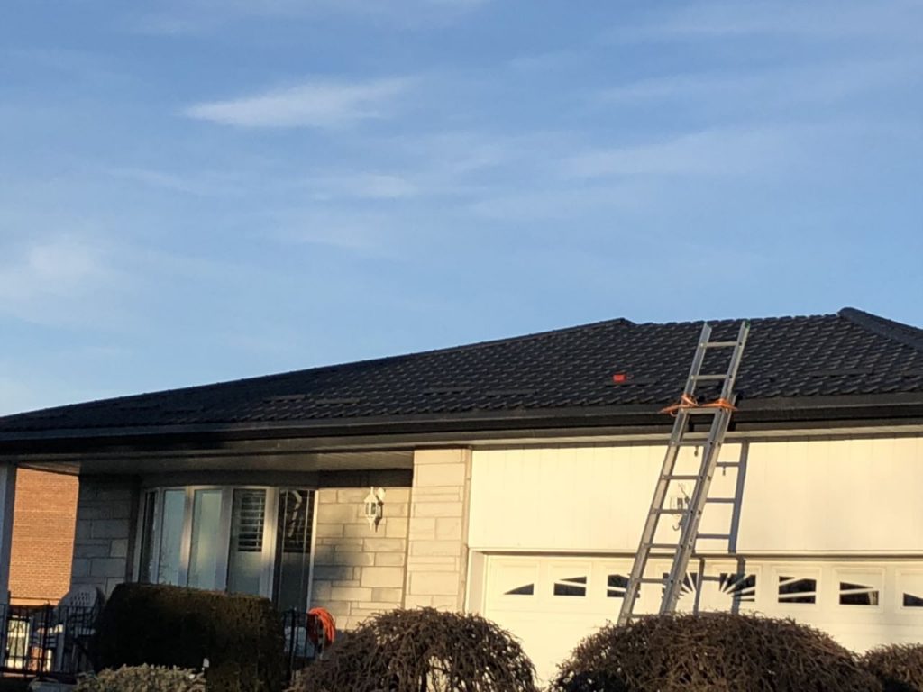 Black steel roof installation