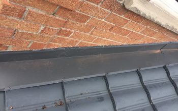 Metal roof side flashing with sealer